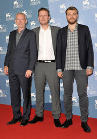 Soren Malling, director Tobias Lindholm and Pilou Asbaek at the photocall of "A Hijacking" during the 69th Venice Film Festival in Italy.