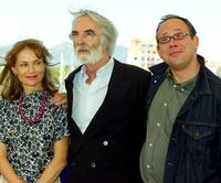 Isabelle Huppert, director Michael Haneke and Olivier Gourmet at the photocall of "Le Temps du loup" during the 56th International Cannes Film Festival.