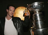 Jason Gray-Stanford poses with the NHL Stanley Cup at Republic Restaurant.