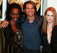 April Grace, Tom Cruise and Julianne Moore at the premiere of "Magnolia."