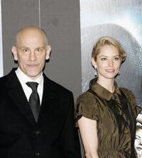 John Malkovich and Sienna Guillory at the world premiere of "Eragon."