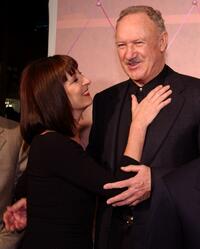 Gene Hackman and Anjelica Huston hug at the premiere of the film "The Royal Tenenbaums".