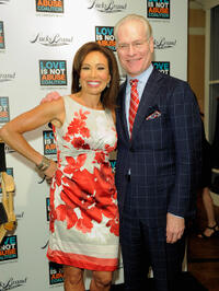 Tim Gunn and Guest at the iPhone App Launch of "Love Is Not Abuse" in New York.