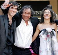 Romain Duris, director Tony Gatlif and Lubna Azabal at the official projection of "Exils" during the Cannes Film Festival.