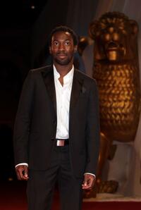 Cyril Guei at the premiere of "L'Autre" during the 65th Venice Film Festival.