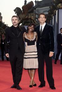 Director Alfonso Cuaron, Claire-Hope Ashitey and Clive Owen at the premiere of "Children Of Men" during the 63rd Venice Film Festival.