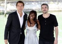 Clive Owen, Claire-Hope Ashitey and Director Alfonso Cuaron at the photocall of "Children Of Men" during the 63rd Venice Film Festival.