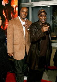 Arsenio Hall and Barry Bonds at the premiere of "Dreamgirls".