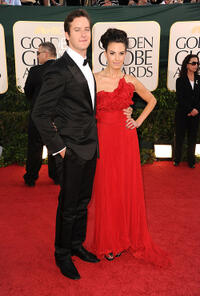 Armie Hammer Jr. and Elizabeth Chambers at the 68th Annual Golden Globe Awards.