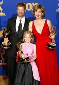 Joel Gretsch, Dakota Fanning and Catherine Dent at the 55th Annual Primetime Emmy Awards.