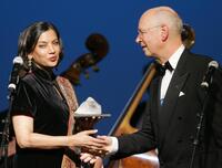 Shabana Azmi and Klaus Schwab at the World Economic Forum during a ceremony.