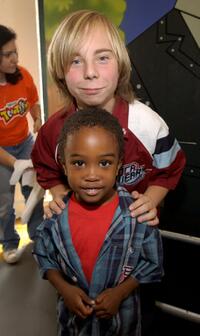 Steven Anthony Lawrence and Khamani Griffin at the Disney's Toontown Online Takes Hollywood celebrity charity video game event.