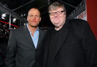 Woody Harrelson and Michael Moore at the New Line premiere of "Semi-Pro".