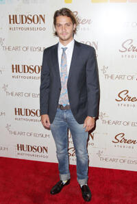 Luke Grimes at the The Art Of Elysium's Genesis in California.
