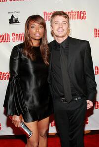 Aisha Tyler and Garrett Hedlund at the premiere of "Death Sentence."