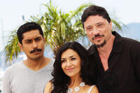 Tenoch Huerta, Dolores Heredia and Carlos Bardem at the photocall of "Dias De Garcia" during the 64th Cannes Film Festival.