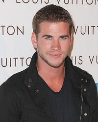 Liam Hemsworth at the opening of "Louis Vuitton Santa Monica To Benefit Heal The Bay" in California.
