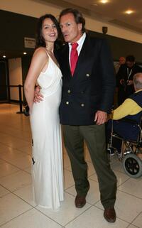 Armand Assante and Maria Dinulescu at the Palais des Festivals during the 60th International Cannes Film Festival, for closing ceremony of "Un Certain Regard".