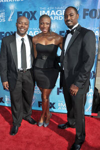 Writer Phononzell Williams, Aisha Hinds and writer Mike Flynn at the 42nd NAACP Image Awards in California.