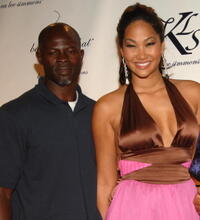 Djimon Honsou and Kimora Lee Simmons at the Baby Phat fashion show.