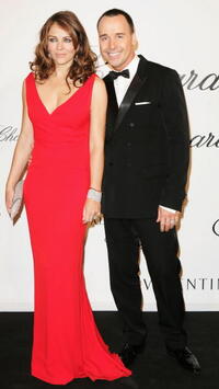 Elizabeth Hurley and David Furnish at the Chopard and Valentino Party Dinner during the 60th International Cannes Film Festival.