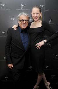 Designer Giuseppe Zanotti and Cody Horn at the Giuseppe Zanotti Design Beverly Hills Store opening in California.