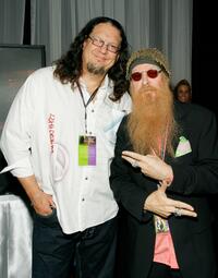 Penn Jillette and Billy Gibbons at the Distinctive Assets gift lounge during the Academy of Country Music Awards.