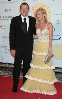 Lance Armstrong and Guest at the post haute couture show gala dinner and ball in Parco dei Daini.