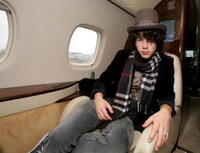 Nick Jonas at the Embraer RJ135 private jet in UK.