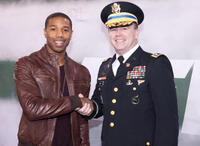 Michael B. Jordan and Lt. Colonel Rich Davis at the Salute To The Tuskegee Airmen on Veteran's Day Weekend during the New York Jets Vs. New England Patriots Game in New Jersey.