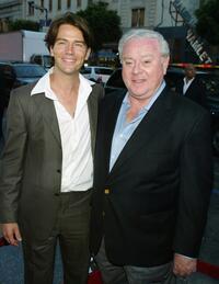 Antonie Kamerling and Producer James Robinson at the premiere of "Exorcist: The Beginning."