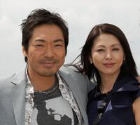 Teruyuki Kagawa and Kyoko Koizumi at the cast photocall of "Tokyo Sonata" during the 61st International Cannes Film Festival.