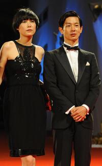 Rinko Kikuchi and Ryo Kase at the screening of "The Sky crawlers" during the 65th Venice International Film Festival.