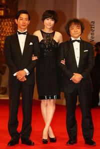 Ryo Kase, Rinko Kikuchi and director Mamoru Oshii at the premiere of "The Sky crawlers" during the 65th Venice International Film Festival.