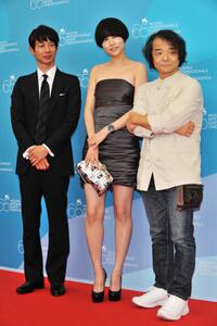 Ryo Kase, Rinko Kikuchi and director Mamoru Oshii at the photocall of "The Sky crawlers" during the 65th Venice International Film Festival.