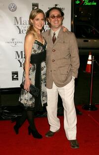 Julie Benz and John Kassir at the premiere of "Man of the Year."