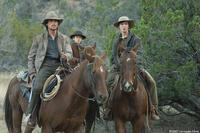 Dan Evans (Christian Bale) and his sons Mark Evans (Ben Petry) and William Evans (Logan Lerman) in "3:10 to Yuma."