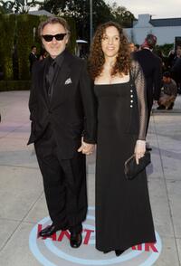 Harvey Keitel and a guest attend The 2004 Vanity Fair Oscar Party.