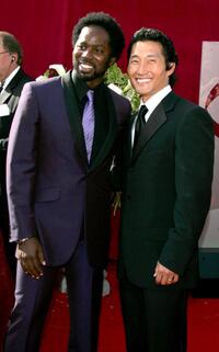 Harold Perrineau Jr. and Daniel Kim at the 57th Annual Emmy Awards.