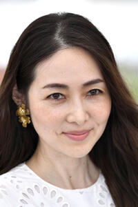 Reika Kirishima at a photocall for "Drive My Car" during the 74th Cannes Film Festival.