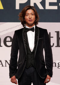 Takuya Kimura at the press conference of gala presentation of "I Come with the Rain" during the 14th Pusan International Film Festival.
