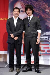 Masayuki Suzuki and Takuya Kimura at the premiere of "HERO" during the 12th Pusan International Film Festival.