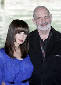 Mia Kirshner and Brian De Palma at the photo call of "The Black Dahlia", at the 63nd Venice Film Festival.
