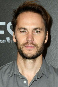 Taylor Kitsch at the photocall for "21 Bridges" in Beverly Hills, California.