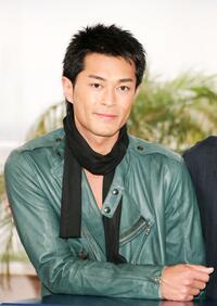 Louis Koo at the photocall of "Election" during the 58th International Cannes Film Festival.