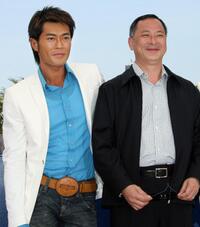 Louis Koo and director Johnny To at the photocall of "Election 2" during the 59th International Cannes Film Festival.
