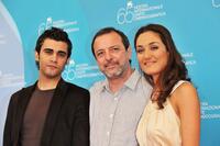 Melih Selcuk, director Semih Kaplanoglu and Basak Koklukaya at the photocall of "Sut" during the 65th Venice Film Festival.