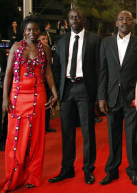 Djeneba Kone, Diouc Koma and director Mahamat-Saleh Haroun at the premiere of "Un Homme Qui Crie" during the 63rd Cannes Film Festival.