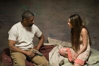Denzel Washington as Eli and Mila Kunis as Solara in "The Book of Eli."