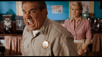 Dan Lauria as Officer Dawson and Jenni Baird as Tammy in "Alien Trespass."